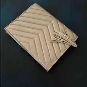 Neiman Marcus Metallic beige evening clutch bag. 7" x 9"